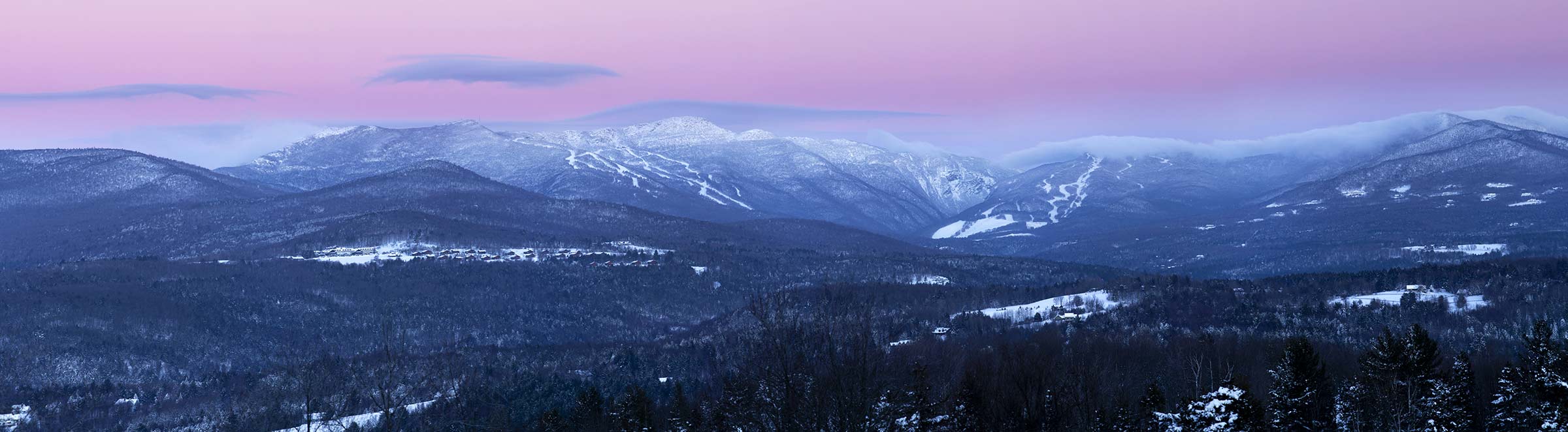 evening photo of ski mountains