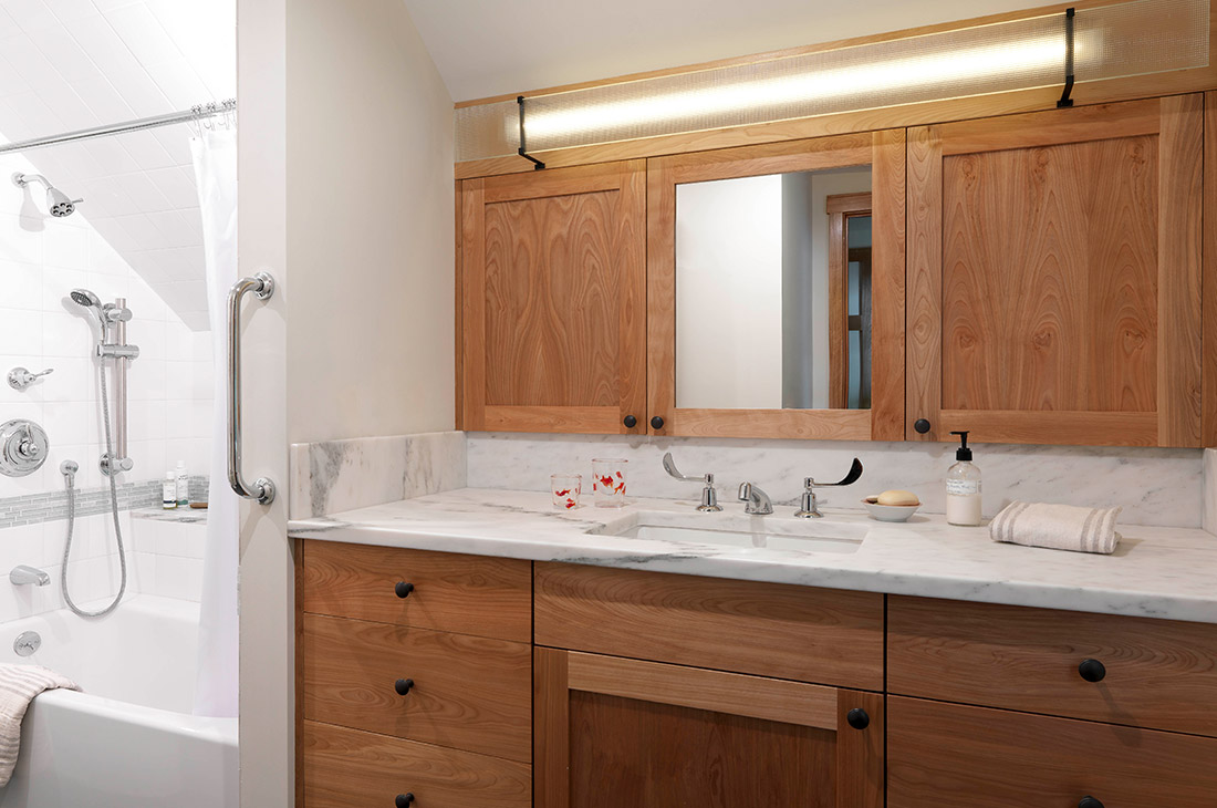 picture of the bathroom with marble countertip