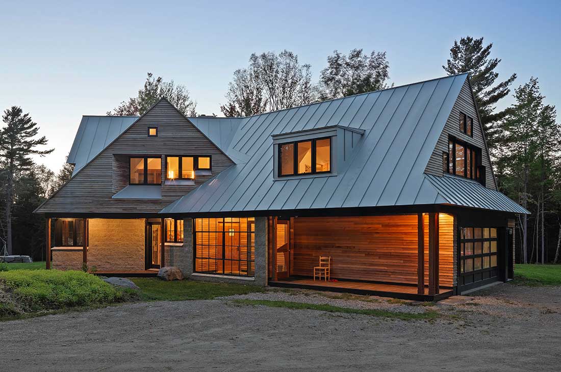 exterior of the home with garage and entrance area