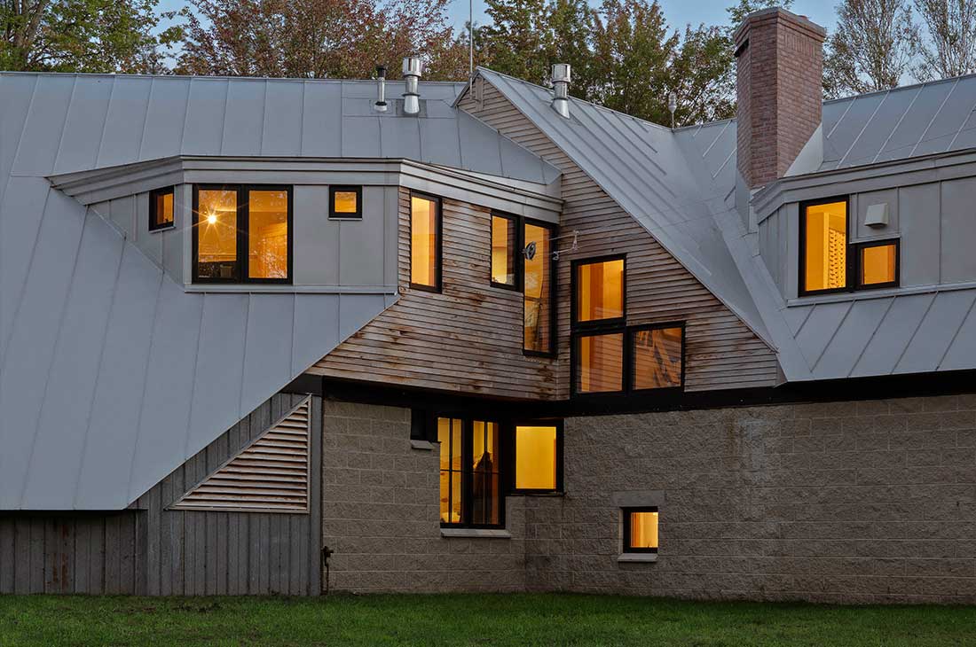 exterior, back of the home with modern angles and windows