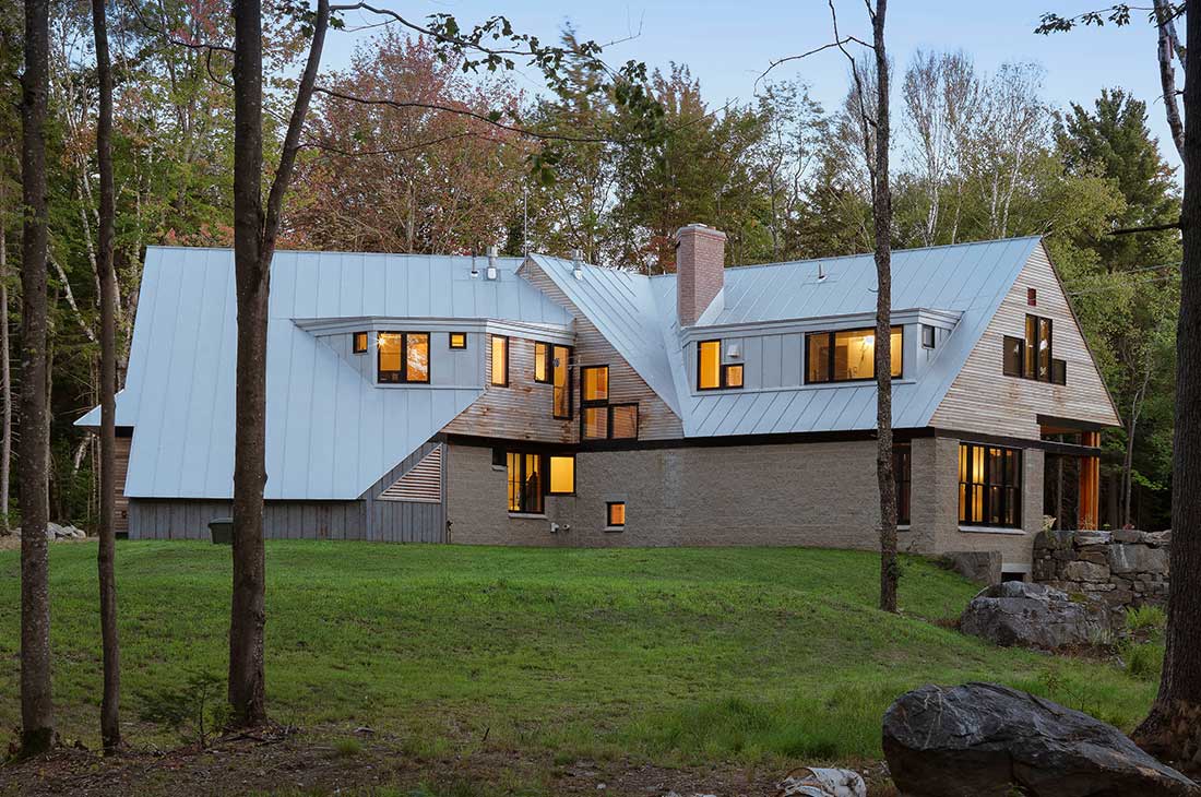 exterior of the home from the woods