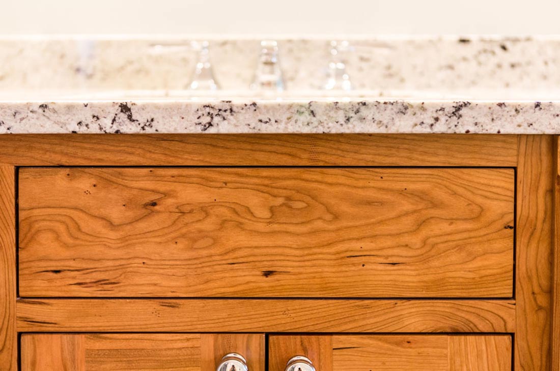 granite countertops and wooden cabinets