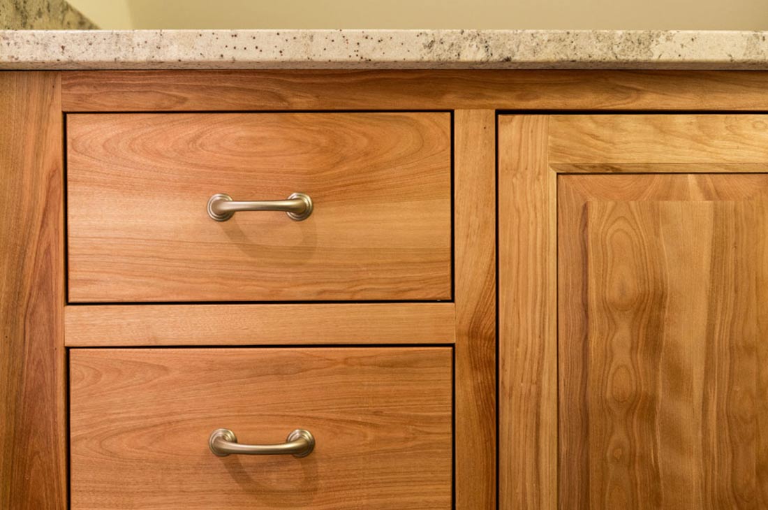 granite countertops and wooden cabinets
