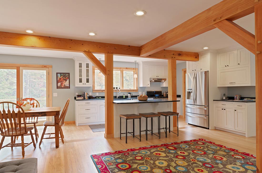 picture of the kitchen with timber frame and dining area