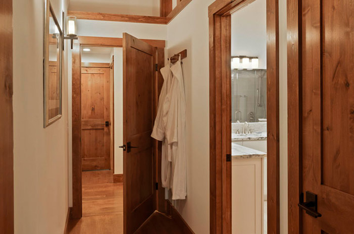 hallway with wooden doors