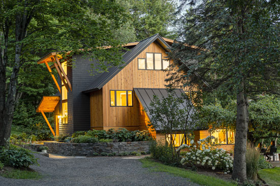 red home with timber deck