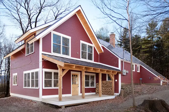 red house with deck