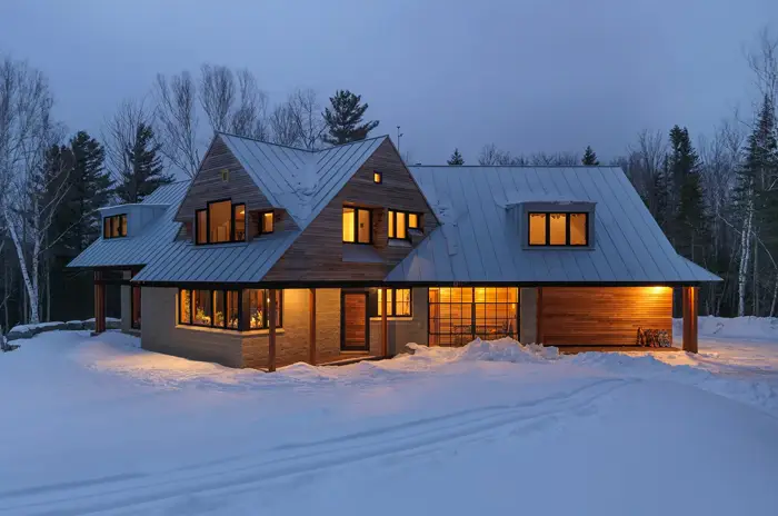 wooden modern home in the winter
